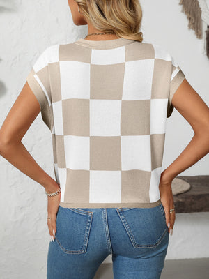 Checkerboard knit cap sleeve top in beige and white with a crew neck.