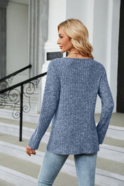 Dusty Blue ribbed tunic top with button detail and asymmetric hem.