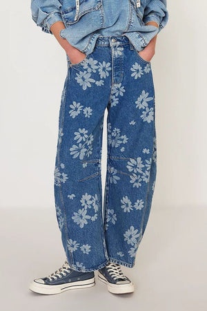Floral print balloon jeans in medium wash denim with a relaxed fit.