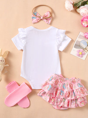 White ruffled sleeve bodysuit with pink Easter egg print ruffled skirt and headband.