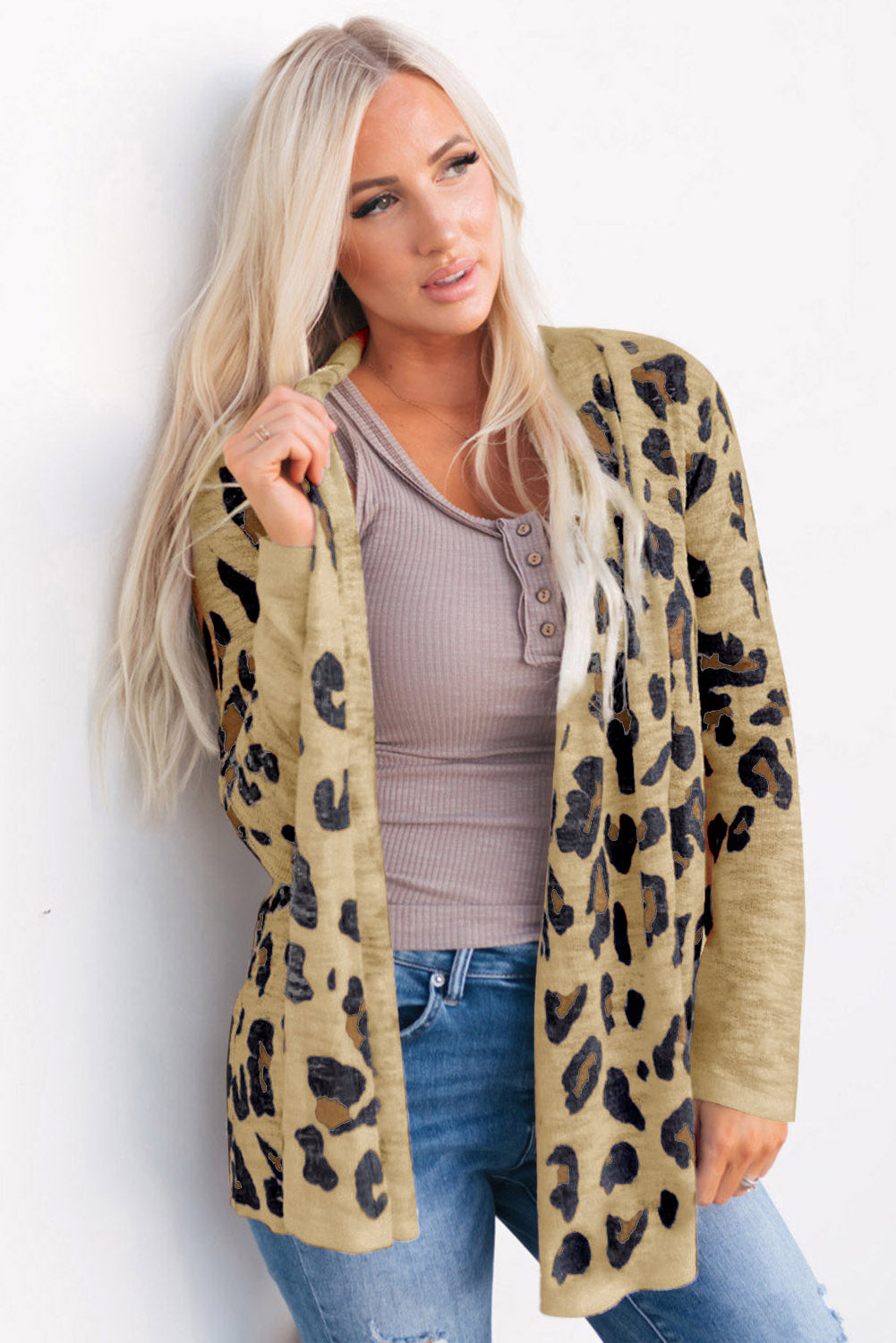 Tan leopard print open-front knit cardigan with a relaxed fit.