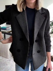 Double-breasted gray wool blend blazer with contrasting ribbed knit sleeves and button front.