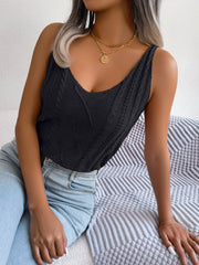 Black cable knit diamond vest top with a V-neck.