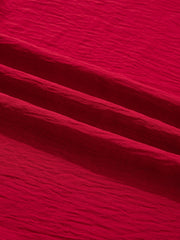 Deep red braided V-neck blouse with textured fabric detail