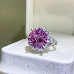 Radiant Blossom cocktail ring in silver with large pink gemstone and sparkling accents.