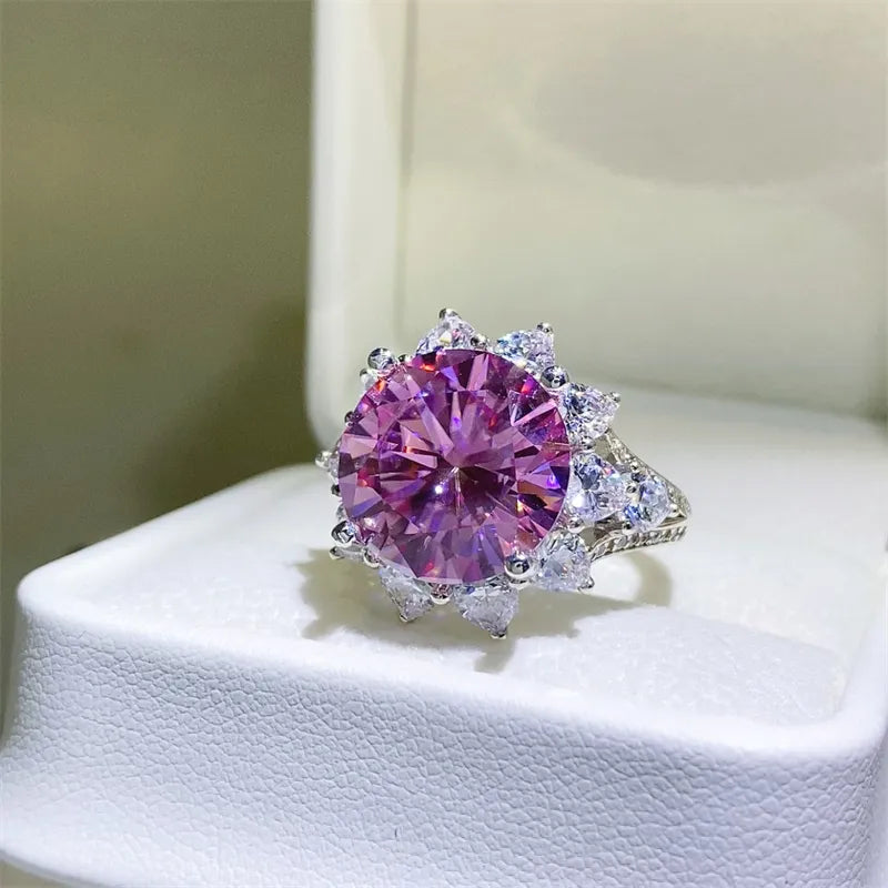 Radiant Blossom cocktail ring in silver with large pink gemstone and sparkling accents.