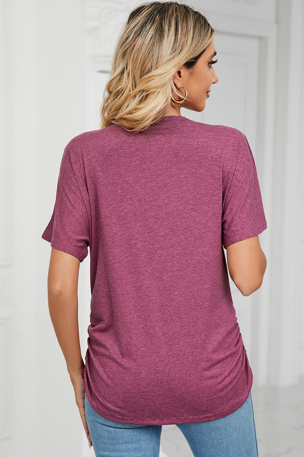 Dusty Pink tee with V-neck, short sleeves, and side ruching detail.