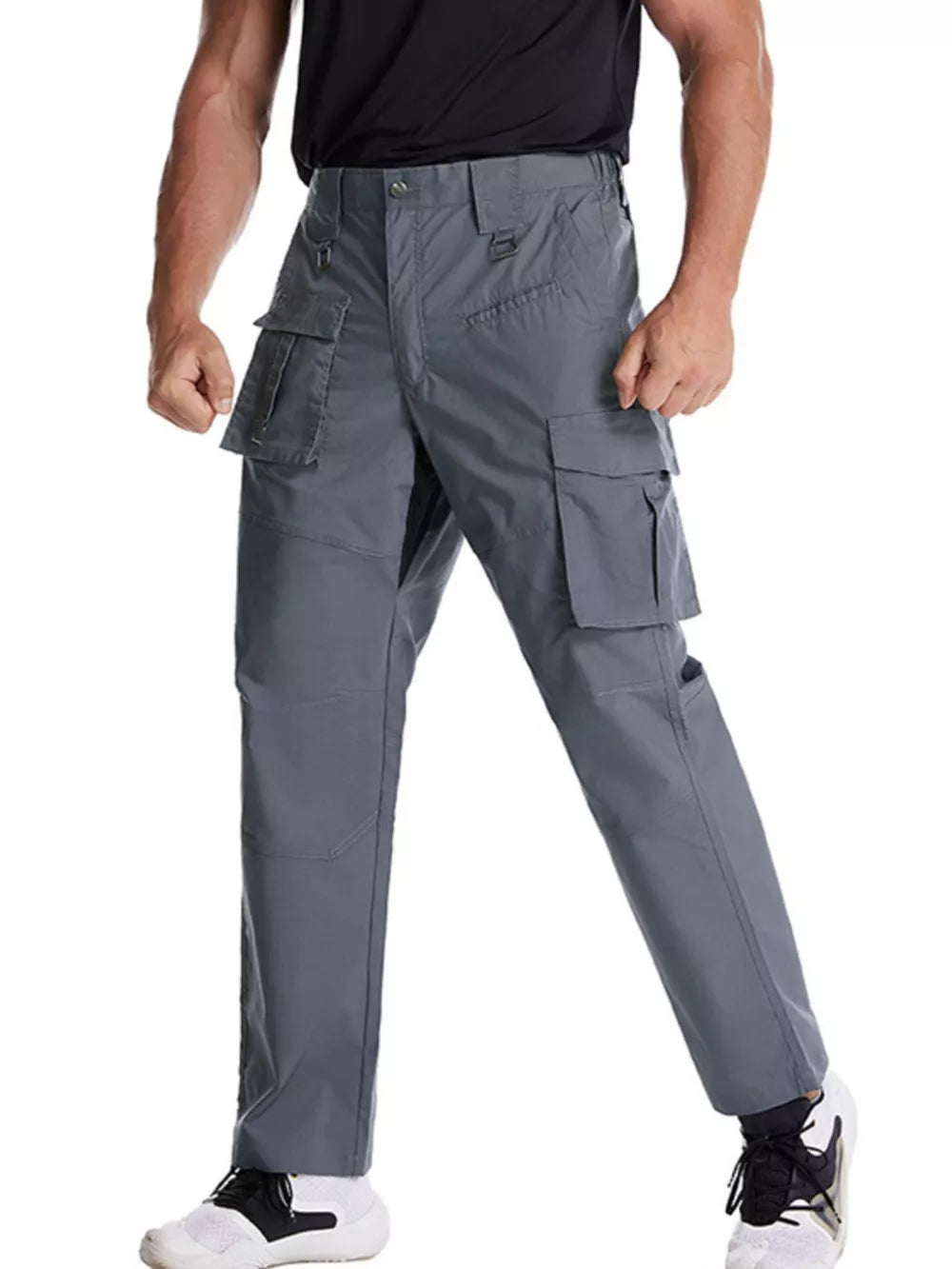Men's grey functional cargo pants with multiple pockets and a relaxed fit.