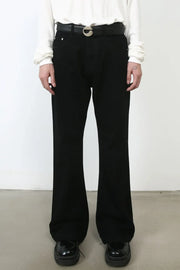 Black bootcut denim jeans with a casual fit and a silver buckle belt.