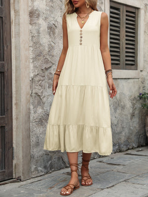 Beige tiered midi sundress with V-neck and button detail, sleeveless, casual boho style