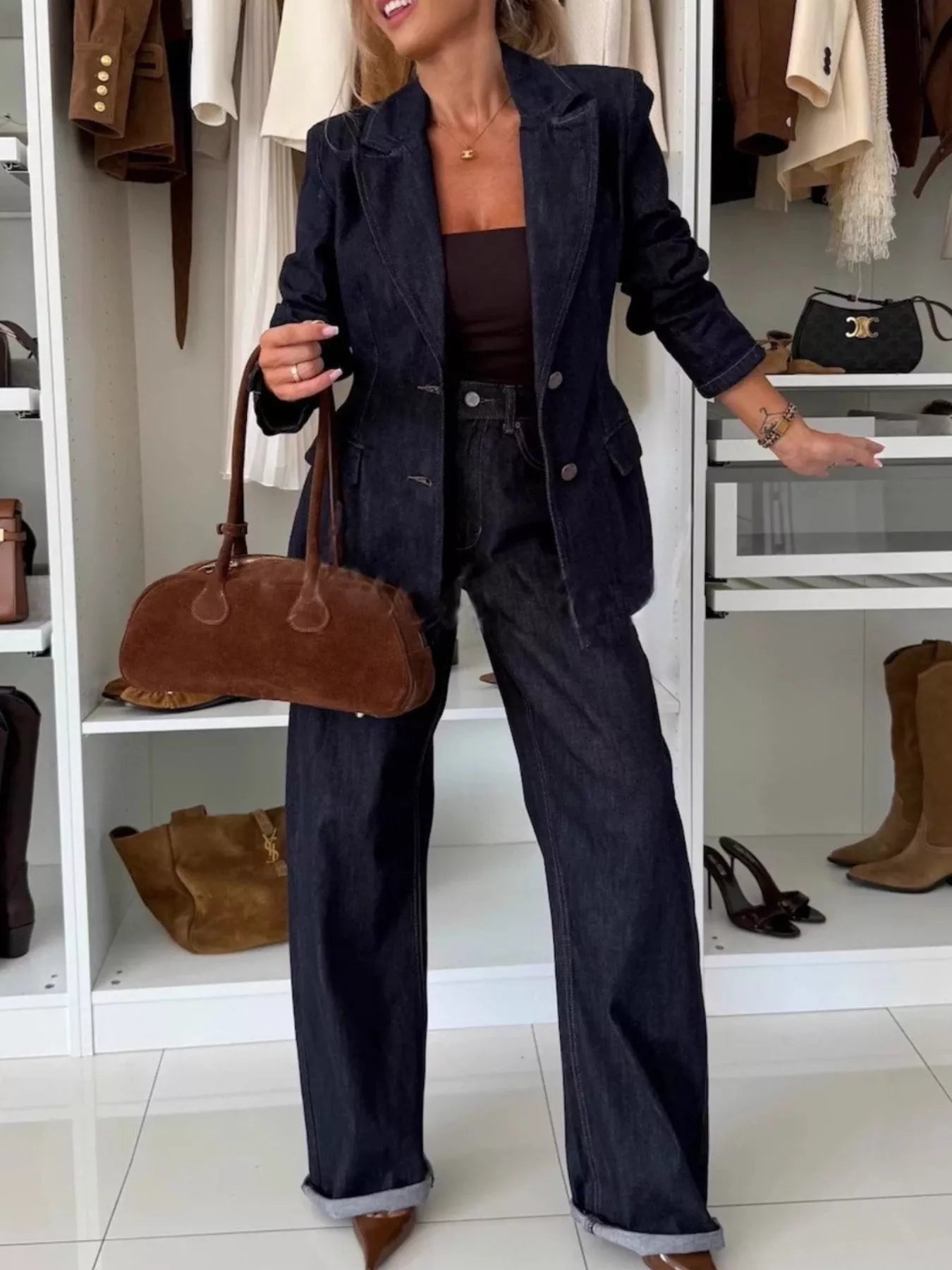 Dark blue denim pant suit with double-breasted blazer and wide-leg pants.