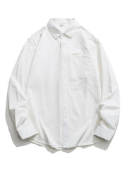 White cotton button-down shirt with long sleeves and a chest pocket.