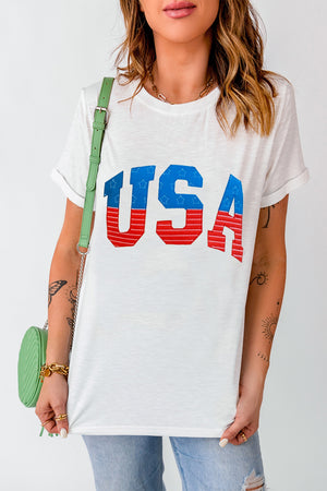 White t-shirt with USA appliqué, rolled cuffs, and a crew neck.