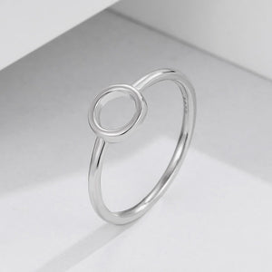 Sterling silver ring with a minimalist open circle design.