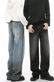 Pocketed high rise slouchy denim jeans in medium and dark washes.