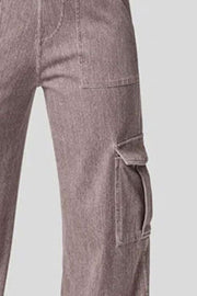 Utility denim wide-leg cargo pants in mocha with flap pockets.