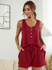 Burgundy ribbed Henley tank top with button detail and drawstring shorts.