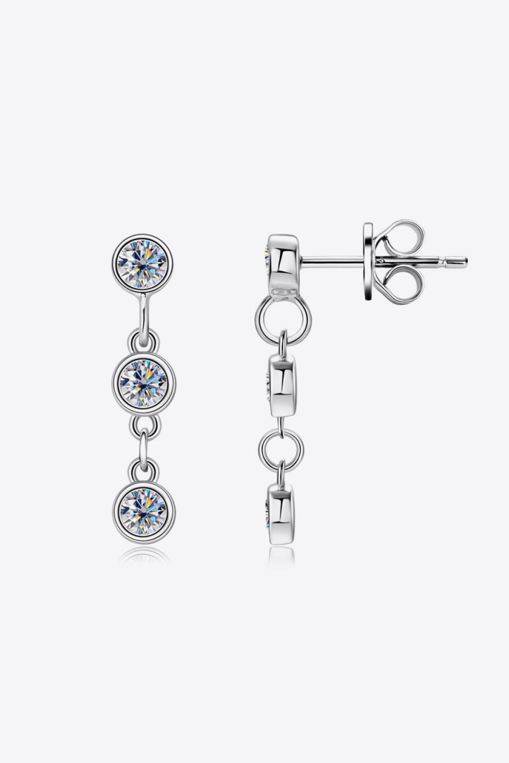 Silver triple stone cascade earrings with clear cubic zirconia.