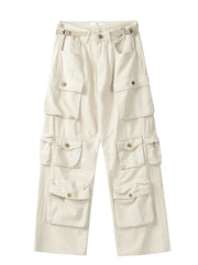 Cream cargo pants with versatile multi-pocket design and buttoned flaps.