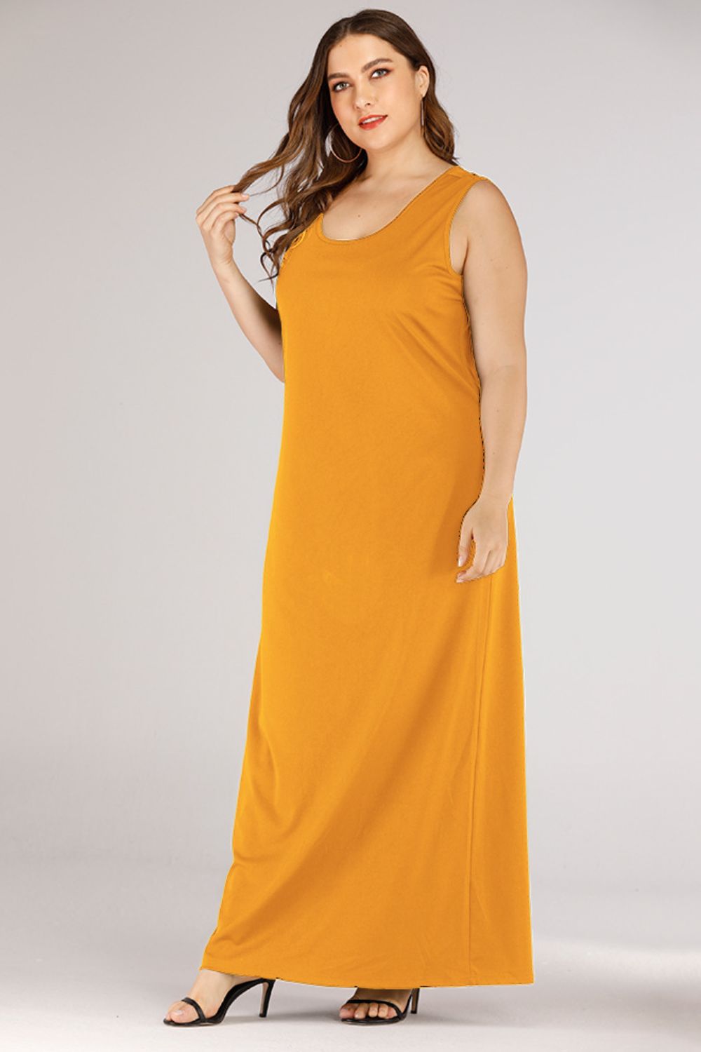 Sleek scoop-neck maxi column dress in gold, sleeveless, floor-length, basic style.