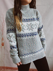Geometric knit mockneck pullover in Cloudy Blue with snowflake pattern, acrylic blend.