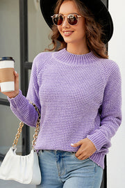 Lavender waffle knit raglan sleeve pullover sweater with mock neck.
