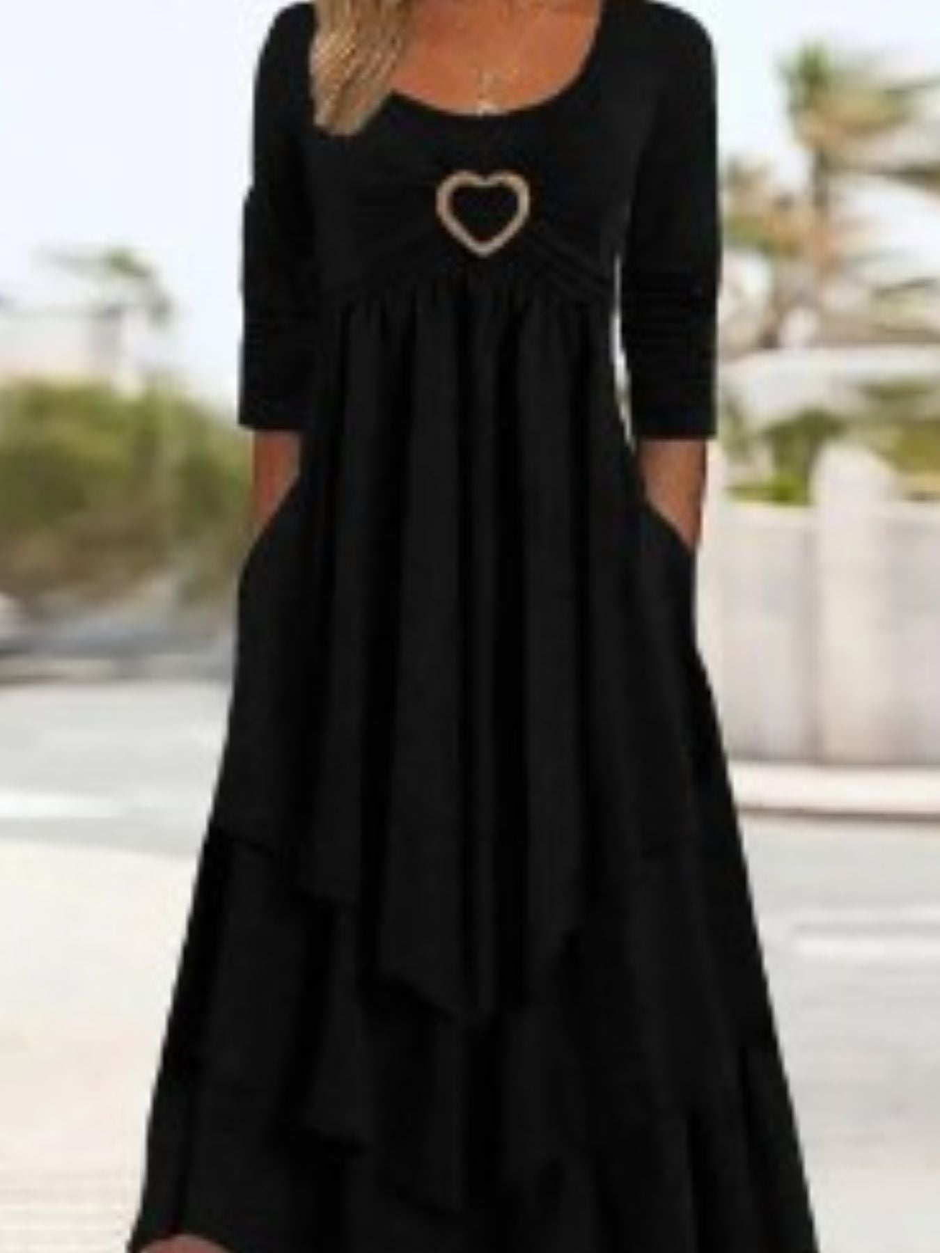 Black midi dress with heart detail and tiered skirt