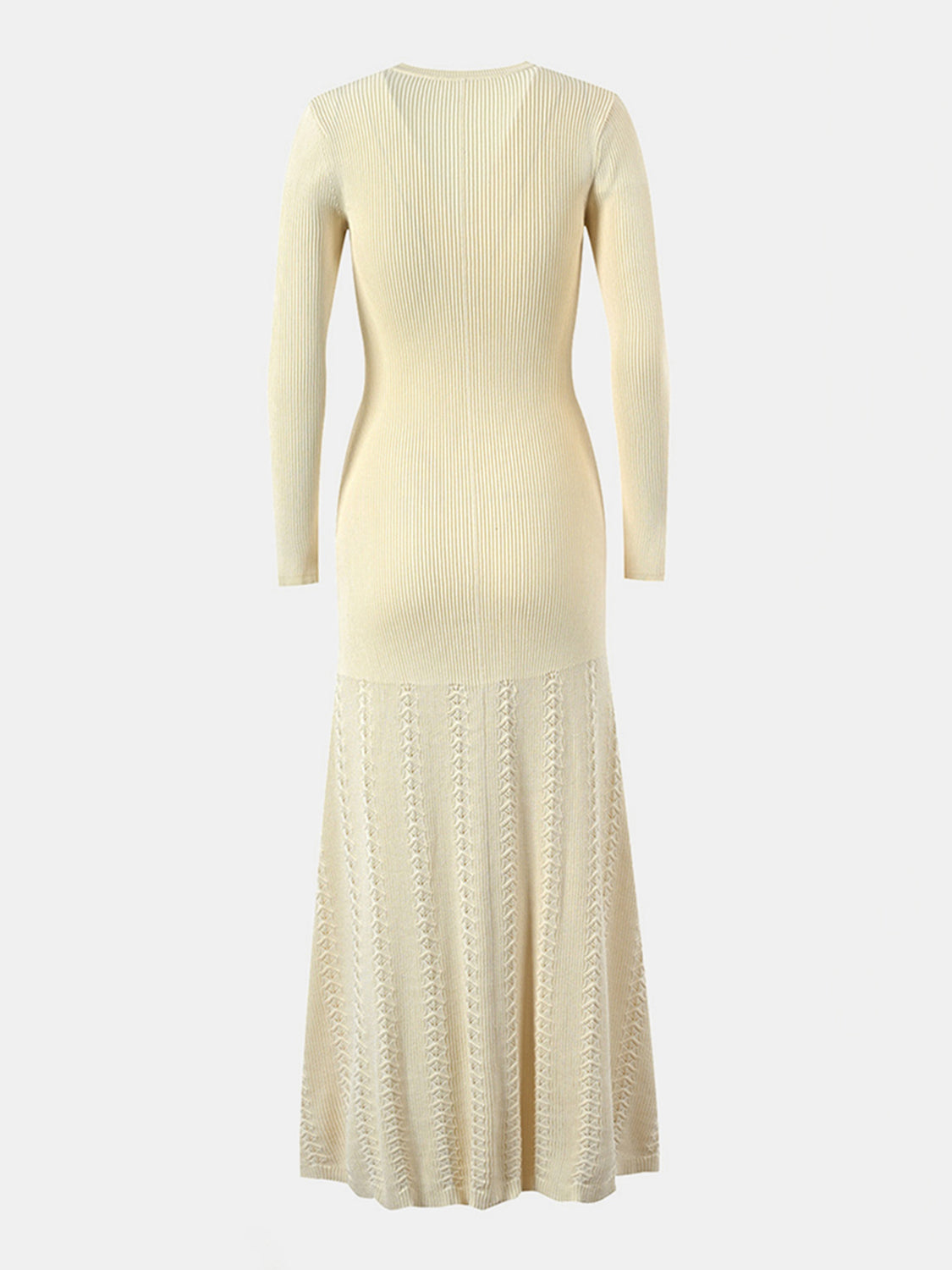 Pastel yellow ribbed knit maxi dress with decorative button detail and patterned skirt.