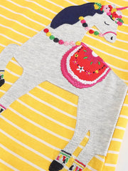 Yellow striped cotton blend toddler dress with a whimsical unicorn applique and colorful details.