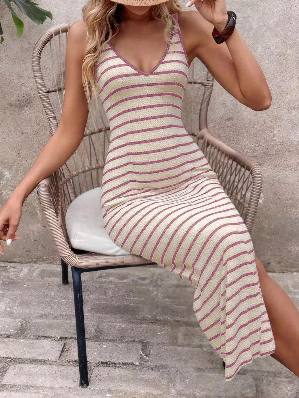 Ribbed striped bodycon midi dress in cream with pink stripes, V-neck, sleeveless.