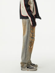 Men's distressed jeans with unique wash and ripped details