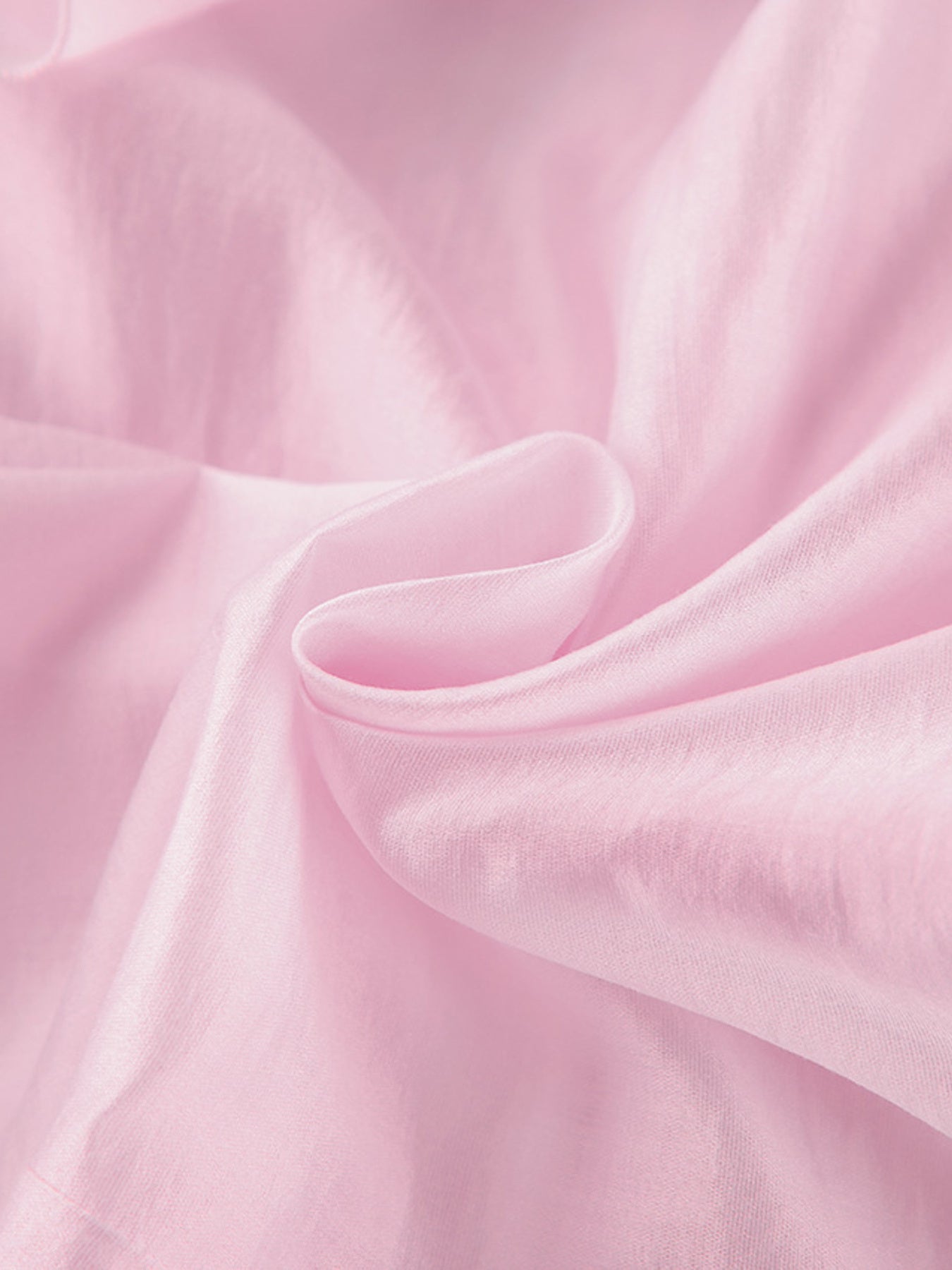 Blush pink long sleeve blouse with ruffle trim detail, casual women's apparel.