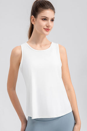 White performance tank top with curved hem and crew neck.