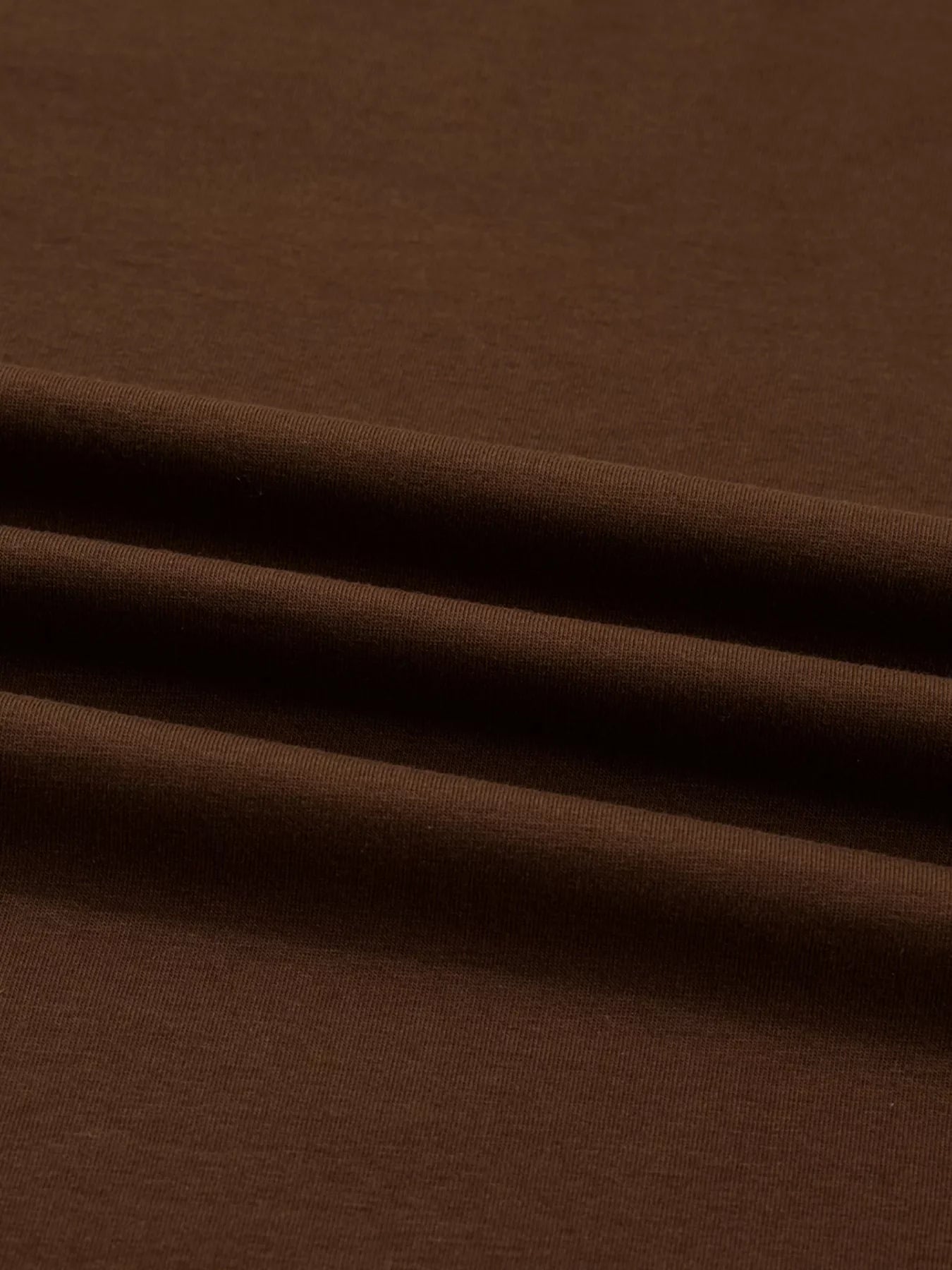 Dark brown cotton blend crew neck long-sleeve t-shirt fabric detail