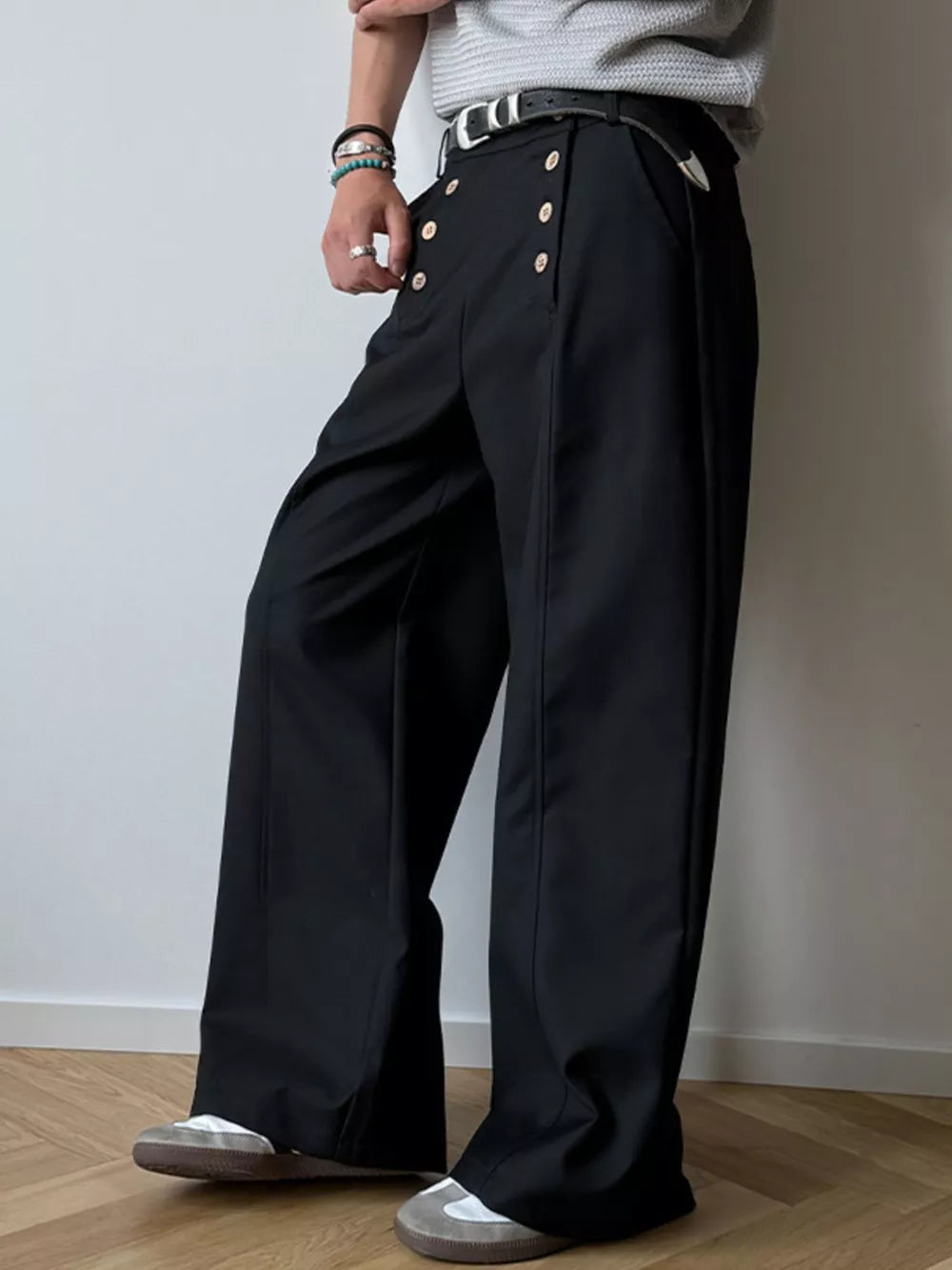 Black high-waisted wide leg pants with button detail