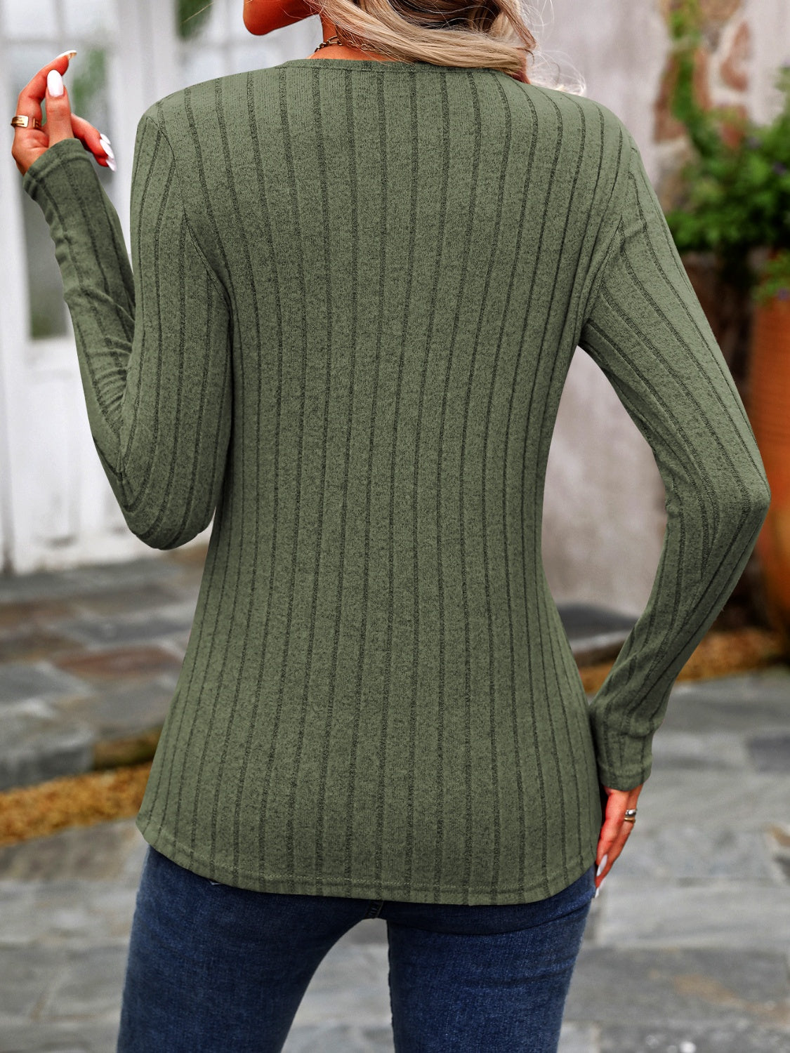 Moss green ribbed knit top with round neck and button detail