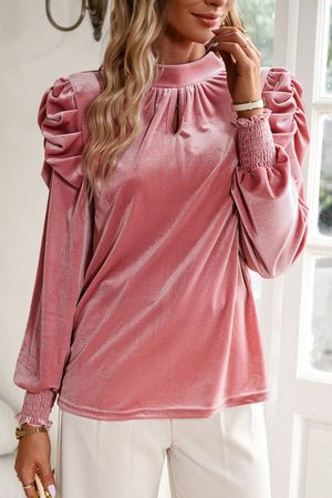 Dusty Pink velvet blouse with keyhole neckline, puff sleeves and smocked cuffs.