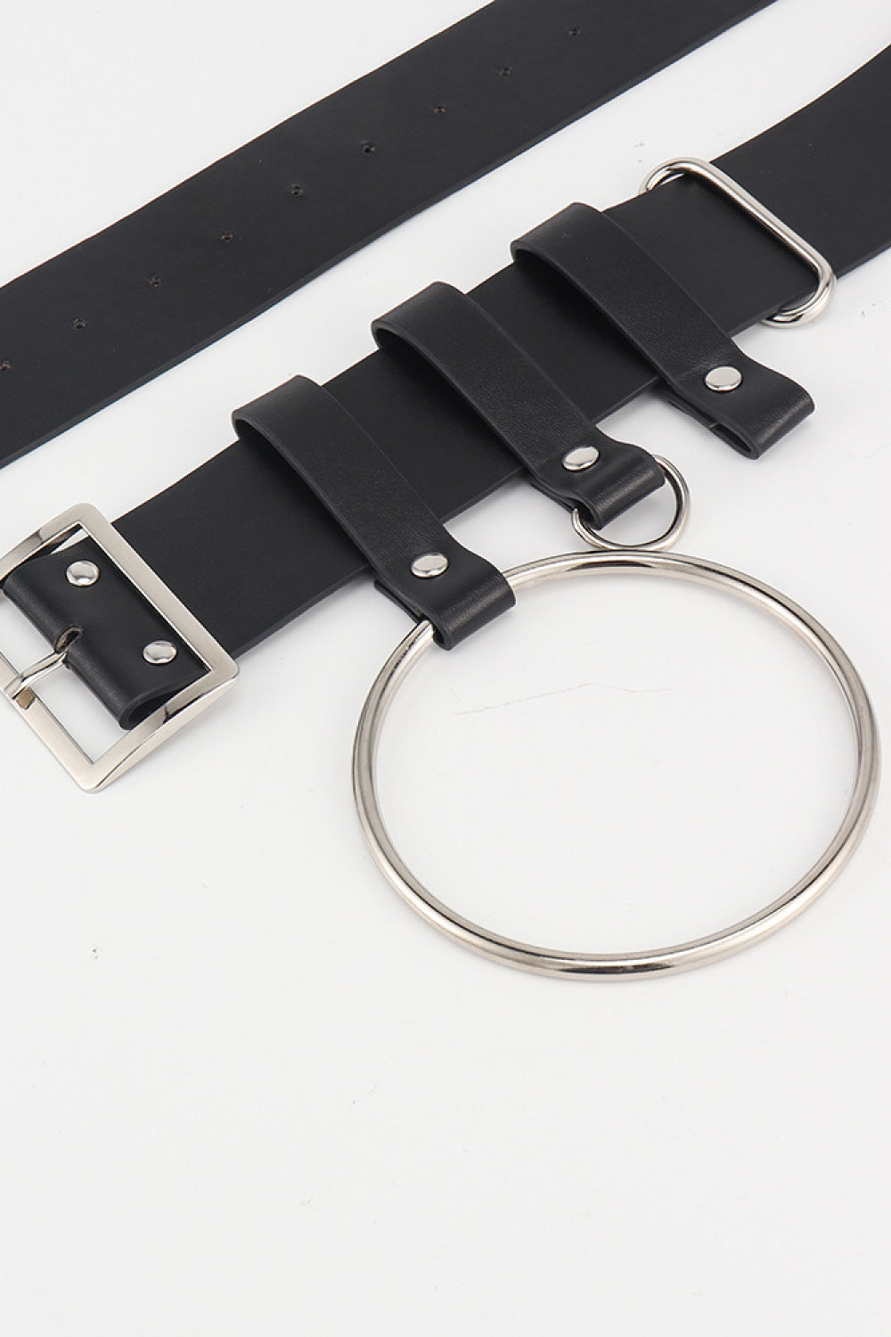 Black leather belt with silver buckle and large ring detail