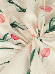 Cream midi dress with pink tulip print and twist front detail