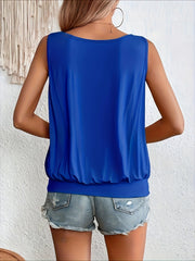 Royal blue gathered front tank top with elastic hem, worn with denim shorts.