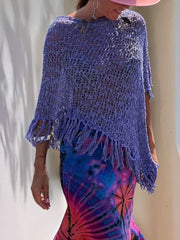 Purple open-knit poncho with boat neck and fringe trim, acrylic material.