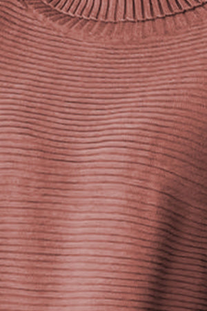 Brick red ribbed turtleneck sweater with a textured knit and a high neckline.