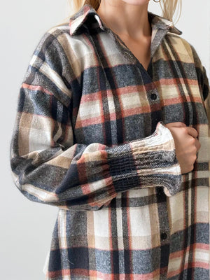 Textured plaid shirting with ribbed cuffs in multicolor.