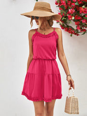 Hot pink camisole tiered mini dress with ruffled neckline and hem