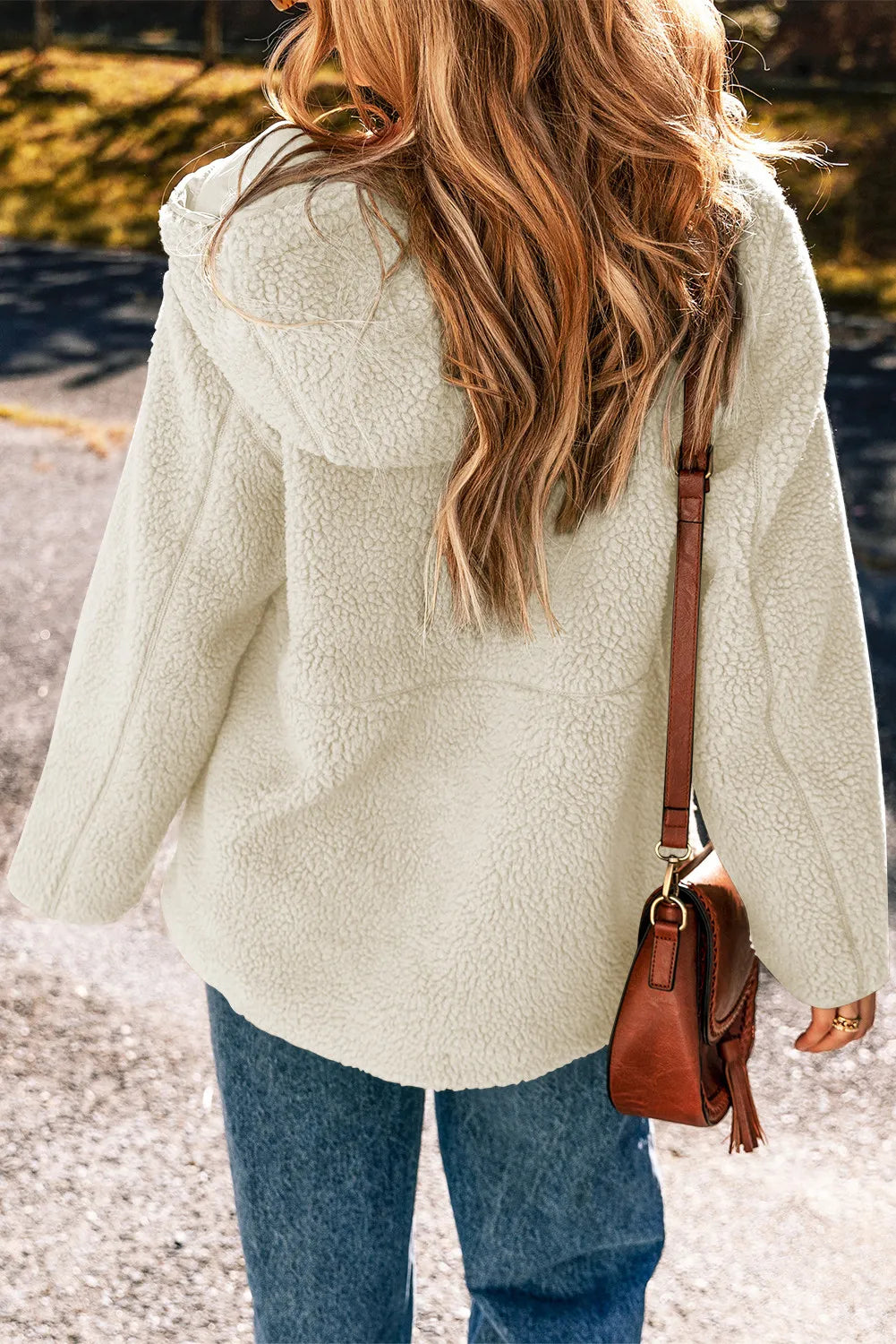 Textured fleece zip-up hoodie in ivory with a hood, shown from the back.