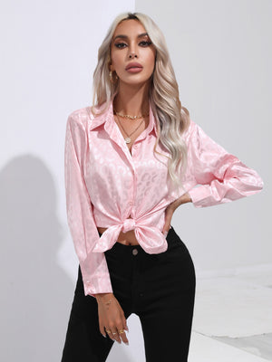 Blush pink satin leopard print tie-front blouse with button-down detail