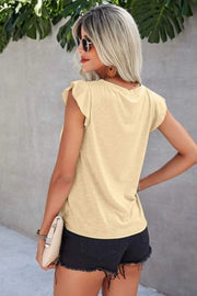 Light Yellow cotton eyelet yoke flutter sleeve top with a casual cut.