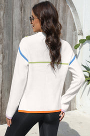 White ribbed quarter-zip pullover sweater with colorblock stripes on sleeves and hem.