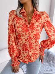 Floral print shirred cuff blouse in pumpkin with button front and collared neckline.