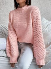 Textured puff sleeve mock neck knit sweater in Dusty Pink acrylic with open knit detail.